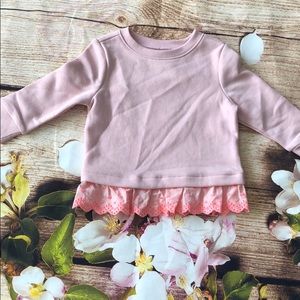 Fleece Sweatshirt with eyelet detail on bottom